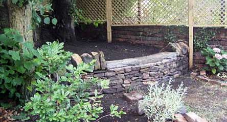 Dry stone garden wall and seating